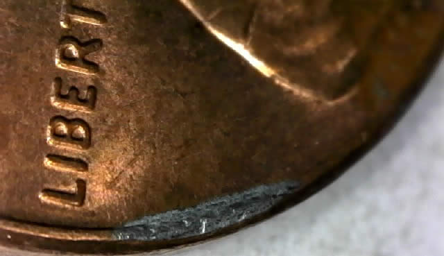 2015-P-Lincoln-Shield-Cent-Struck-Through-Huge-Rim-Burr-Found-In-1-St-Roll!